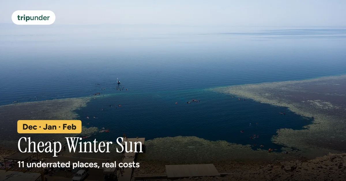 The Blue Hole reef off the coast at Dahab, with the red mountains of Sinai behind