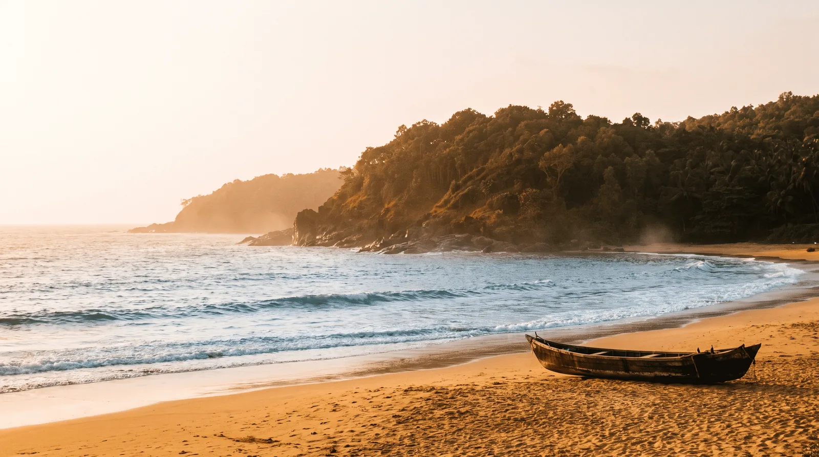 Quiet post-monsoon beach and headland at Gokarna